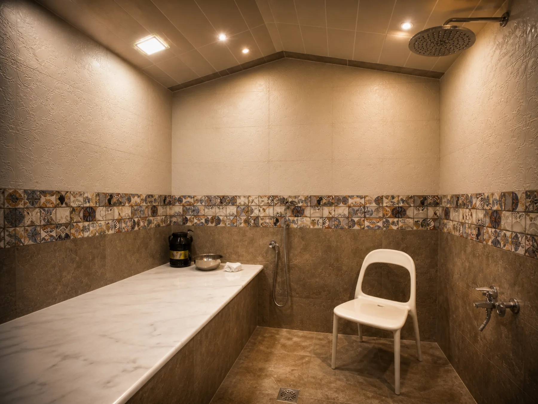 Private Moroccan bath room with marble treatment table